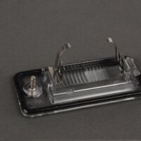 Genuine Audi License Plate Light Lens (Left) – A3 A4 A5 A6 Q7 2001+